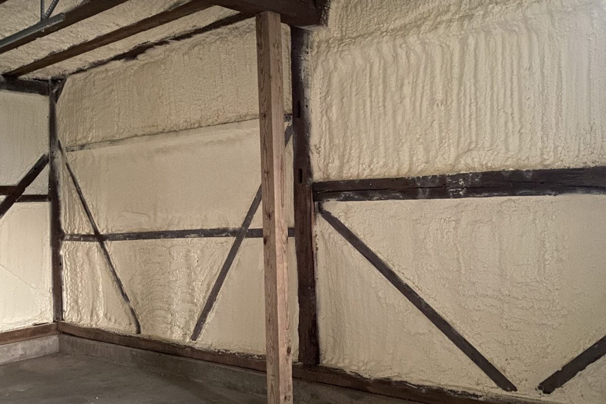 Closed cell spray foam insulation applied to roof deck and walls in Weaver Insulators barn project